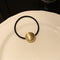 Gold Oval Ball Rubber Band